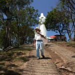 Don Erasmo walks down the pathway that leads to the statue. Cristo Rey is one of the major attractions of Tenangino. Many tourists visit the statue daily.