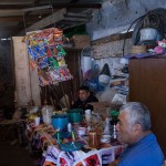 Don Erasmo sits with his son, Gerardo. Now Don Erasmo is fearful he will be kicked out of his house because of a dispute he was with the local authorities.