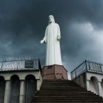 Storm clouds roll into Tenancingo and above the Cristo Rey statue.